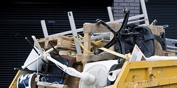 office furniture discarded in a skip