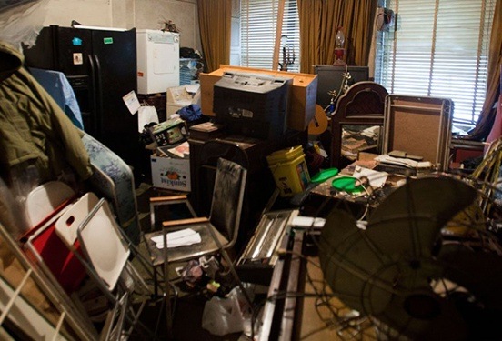 Housing Associations and Social Housing - small room filled with domestic waste
